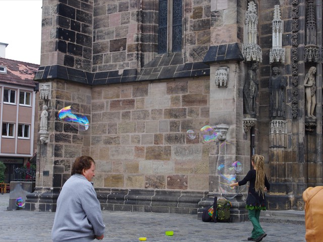 Street performer blowing bubbles
